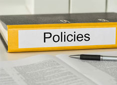 Notebook labeled Policy